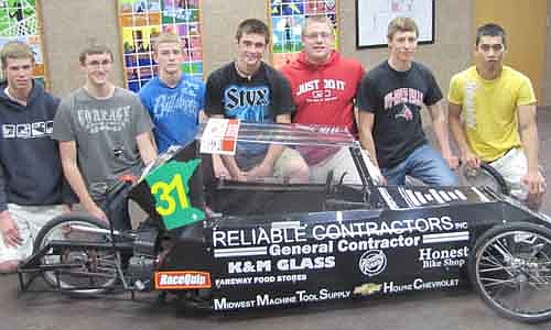Black Magic finished 14th among 41 cars in the Supermileage Challenge's stock class. Builders included, from left, Evan Doty, Michael McClellan, Jason Nelson, Josh Nordine, Nate Zahradnik, Jake Goeldi and Chhay Ouk. 