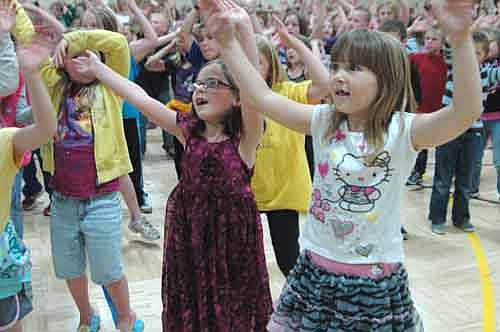 Bonner Elementary School's students and teachers celebrated the end of the school year with music, movement and more last Wednesday, June 5. Above right, Remda Erickson, left, and Camryn Hoth find joy in the music.