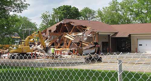 Workers from Bob Braaten Construction of Byron demolished the old Stewartville Fire Hall beginning on Monday afternoon, June 10. The building, which was the Stewartville Fire Department's home since 1972, was torn down to make room for a new Fire Station, which is expected to be completed at the same Main Street location in December. Stewartville residents gave a decisive thumbs-up to the construction of the new Fire Hall on Tuesday, March 5. In all, 557 residents voted yes and 120 said no to the city of Stewartville's request for $1.8 million in general obligation bonds to demolish the old Fire Station and build a new structure at the same location.