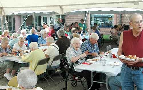 Stewartville Care Center hosted their annual outdoor Family Picnic on Thursday, June 20. Performing good old fashion music was "Casey and the Good Time Band".  Despite the warm humid weather, over 300 people were in attendance. 