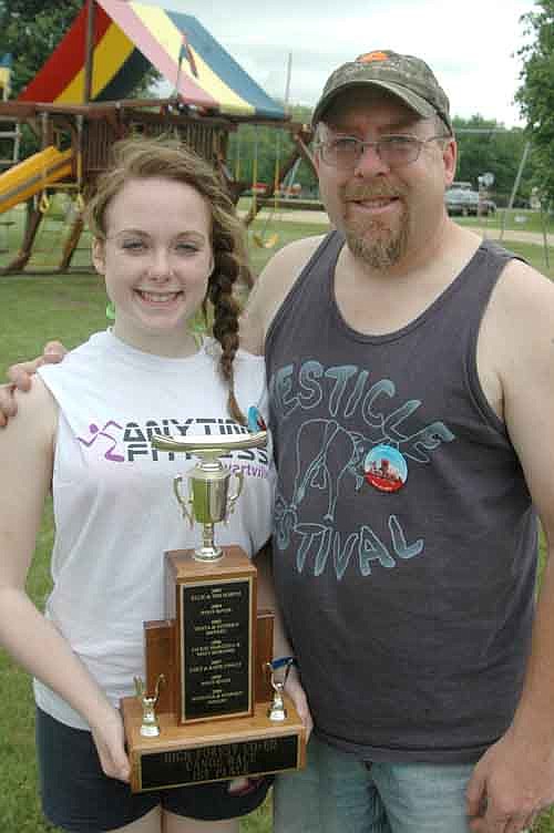 Chet Finley and his daughter Katie won the coed canoe race on the Root River. The key, Chet said, is "don't quit paddling."