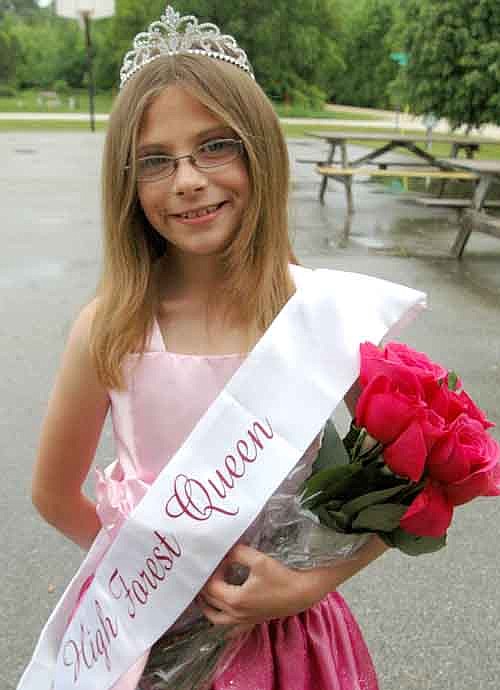 Thea Ebling, 8, was crowned queen of the 90th annual Old Settlers Day. She sold more than 90 Old Settlers Day buttons.