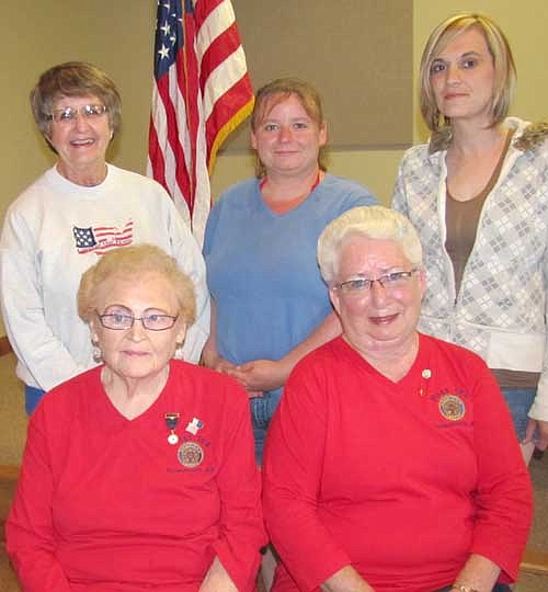 First District President Karen Riess installed the Stewartville American Legion Auxiliary Unit 164's officers for 2013-14 at the Legion on Monday, June 17. Officers include, front row, from left, Donna Carlson, president; and Audrey Farnsworth, treasurer/first vice president. Back row, from left, Sharon Moehnke, second vice president; Tracy Kemp, historian; and Cheri Moore, secretary. Patrice Lager, sergeant at arms; and Viny Byrne, chaplain, are missing from the photo. 