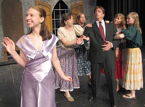Elizabeth (Lee Thureen), left, is constantly reminding her fiancee (Randy Peterson, left) that he is not allowed to touch her in Stewartville Community Theatre's production of Young Frankenstein. Villagers Mikayla Engel, RaeAnn Gotch, Annette Schuler and Holly Gebel enforce the rules. SCT will present Young Frankenstein at the Performing Arts Center this Friday, Aug. 2 and Saturday, Aug. 3 at 7:30 p.m. both evenings; on Friday, Aug. 9 and Saturday, Aug. 10, also at 7:30 p.m. both evenings, and on Sunday, Aug. 11 at 2 p.m. For ticket information, call (507) 533-1432.