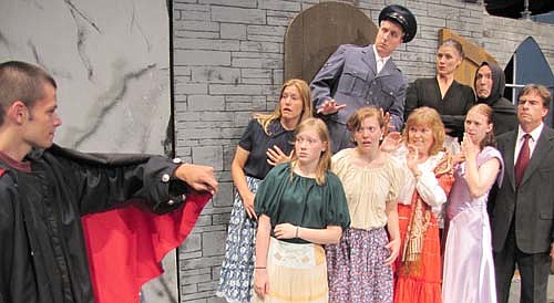 Count Dracula (William Miller), left, makes a surprise appearance at Castle Frankenstein during a dress rehearsal for Stewartville Community Theatre's upcoming presentation of  Young Frankenstein, which will debut at the Performing Arts Center this Friday.