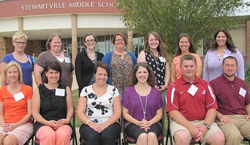 Stewartville's new teachers prepared for the 2013-14 school year at an orientation session at Stewartville High School last Wednesday, Aug. 21. The teachers and their assignments include, front row, from left, Alisa Phelps, middle school art; Elizabeth Schroeder, third grade at Central Intermediate School; Kaysie Manion, high school science; Sarah Meier, middle school choir; Craig Braaten, middle school special ed; and Stephen Nelson, high school science. Back row, from left, Becca Combs-Cawley, middle school band; Andrea Tieskotter, special education at Central Intermediate School; Anne Billington, ELL&#8200;(English Language Learners) at Central; Brittany Thue, school counselor, Bonner and Central; Brooke Haling, fifth grade, Central; Christin Hale, kindergarten; and Juliet Parlette, high school English.