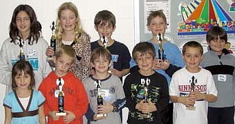 CHESS WINNERS -- Ten Stewartville students in grades K-6 took part in the third annual Byron Invitation chess tournament on Saturday, Dec. 8. Players included, front row, from left, Samantha Koenigs, Colin Willenborg, Andrew Beecher, Daniel Schimke and Adam Koenigs. Back row, from  left, Lily Schimke, Jenna Willenborg, Ben Schimke, Morgan Wildeman and Josh Beecher. 