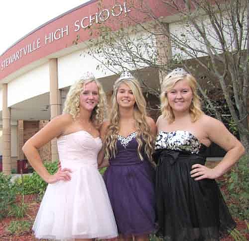 From left below, Caitlyn Hughes, Brianna Henderson and Sandra Drees, all juniors, dressed as princesses to celebrate Stewartville High School's homecoming last Thursday, Sept. 19. Homecoming is fun because it gives students an opportunity to be creative, Sandra said.