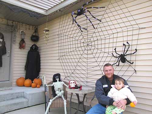 Mathew Baune, 622 12th Ave. Northeast, Stewartville, loves to decorate his home for Halloween. Baune, holding his 18-month-old daughter Ella, says that his decorations have gotten bigger and better each of the past three years. At night, Baune enhances his holiday ensemble with spooky music and a fog machine. "It's lit up every night," he said. "We get quite a few people to stop and look." Halloween has always been special for Baune. "It's the best holiday out there,"&#8200;he said. "I just love Halloween."