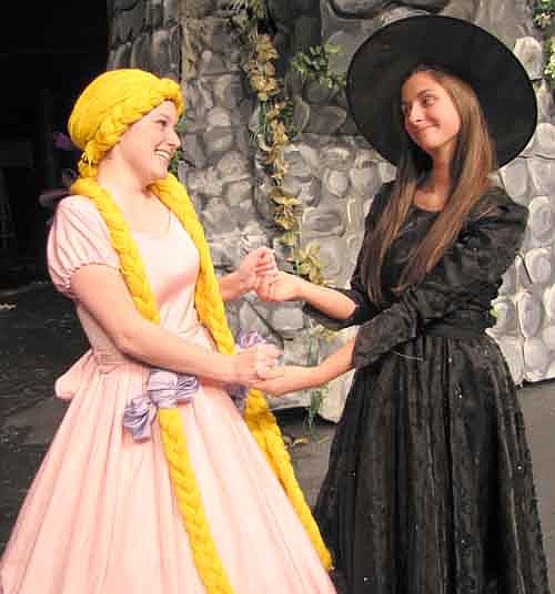  Rapunzel (Cassidy McCartan), left, and the Wicked Witch (Adriana Nelsen-Gross) seem to be enjoying their relationship during a dress rehearsal for the Stewartville High School production of "Rapunzel," which will be presented at the SHS Performing Arts Center this Friday, Nov. 15 and Saturday, Nov. 16 at 7 p.m. both evenings, and this Sunday, Nov. 17 at 2 p.m.