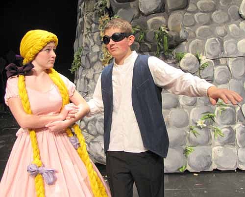 Rapunzel (Cassidy McCartan),  left, guides the blinded Prince Brian (Brandon Lange)&#8200;during a dress rehearsal for Stewartville High School's upcoming performances of "Rapunzel", set to debut at the SHS Performing Arts Center this Friday, Nov. 15 at 7 p.m.