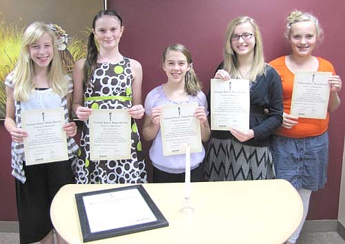 Five students were inducted into the Stewartville Middle School Chapter of the National Junior Honor Society last week. Inductees include, from left, Ellie Fryer, Emily Schlechtinger, JoJo Welter, Sydney Clausen and Kaylee Smidt. Students qualify for the group based on their scholarship, leadership, service, citizenship and character.