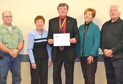 People's Energy Cooperative's Operation Round Up&#174; Trust Board met in October and donated $1,500 to Stewartville Public Schools. The funds granted will be used for presentations by host "Bobby Petrocelli." Pictured from left: Ben Hain (ORU Board), Kathleen McFarland (ORU Board), Dr. David Thompson (Stewartville Public Schools), Judy Swenson (ORU Board) and Lloyd Lowrie (ORU Board).