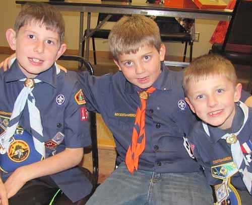 The top three salesmen in the Stewartville Cub Scouts' recent popcorn fund raiser include, from left, Jake Halferty, William Kitzmann and Alex Colligan.