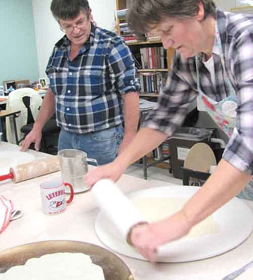 Denny Kiefer, left, and Beth Archer, staff nurses at the Stewartville Care Center, made lefse for the Care Center's residents and staff on Thursday, Dec. 5. Haley Rowley, activities assistant, and Kris DeGeus, head of housekeeping and laundry, not pictured, assisted.