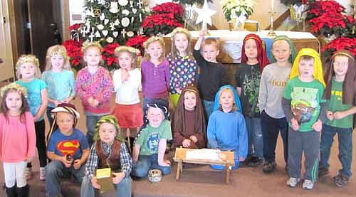 All decked out as shepherds, angels and wise men, the Wee Care children at St. John's Lutheran Church practiced for their annual Christmas program last week.  A large audience turned out for the performance on Saturday, Dec. 14.