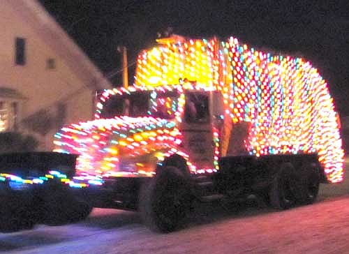 Sunshine Sanitation's brightly decorated truck, earned the first-place prize in the Winterfest parade.