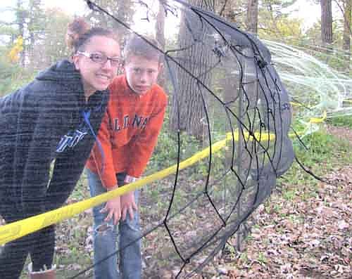Jade Schmeling, left, and her cousin Gabe Nelson, a Stewartville seventh grader, hosted the second annual "Spook City in the Woods" in mid-October.