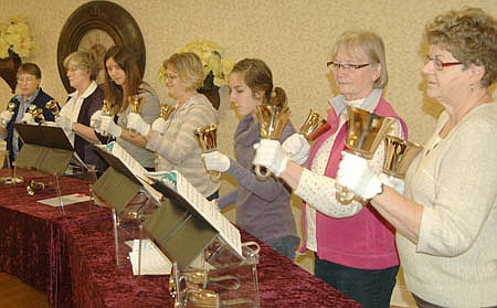 The St. John's Lutheran Church Handbell Choir performed for a large audience at the Stewartville Care Center last week. It was the group's first performance ever outside of the church. Members include, from left, LuAnn Gotch, director; Lana Emmons, Hannah Andrews, Kathy Boettcher, Laura Louks, Kathy Tordsen and Audrey Oehlke.                                                                         
