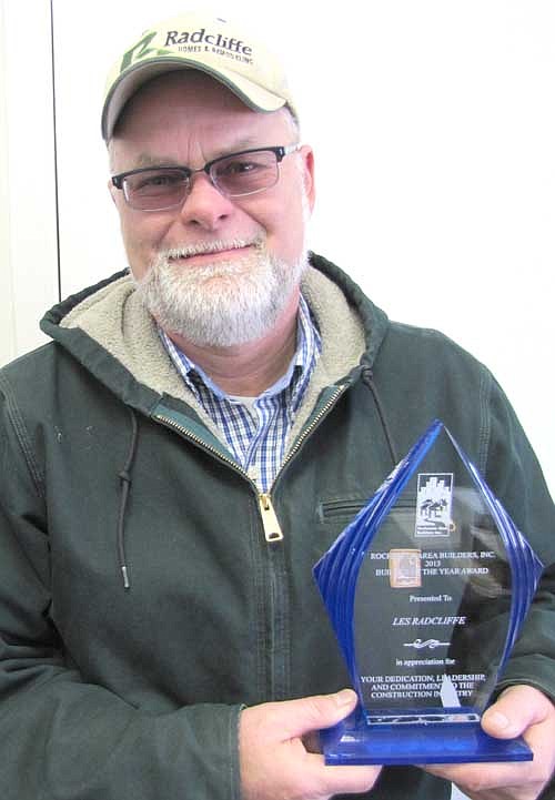 Les Radcliffe of rural Stewartville has received the 2013 Builder of the Year Award from Rochester Area Builders, Inc. He was honored at a meeting at the Ramada Inn in Rochester on Tuesday, Jan. 28. He received a plaque that states, "In appreciation for your dedication, leadership and commitment to the construction industry." Radcliffe also received the award in 1997. "I was quite honored," he said. Radcliffe will be in Booth 905 at the Rochester Area Builders Home Show on Feb. 7, 8 and 9.