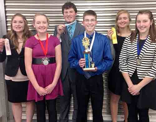 The Stewartville High School Speech Team captured the first-place trophy at the Kasson Komet Invitational, the team's first competition of the year, on Saturday, Feb. 1. In all, 18 teams took part in the event. Individual place winners included, from left, Diana Humble, fourth place in creative expression; CeCe Gray, second in extemporaneous reading; Nathan Lange, third in humorous presentation; Derrick Fritz, third in storytelling; Gabby Steinhoff, fifth in poetry reading; and Calli McCartan, first in prose reading. Dave Honsey, Kelly Manley and Kristen Wingert are the coaches of the SHS Speech Team.