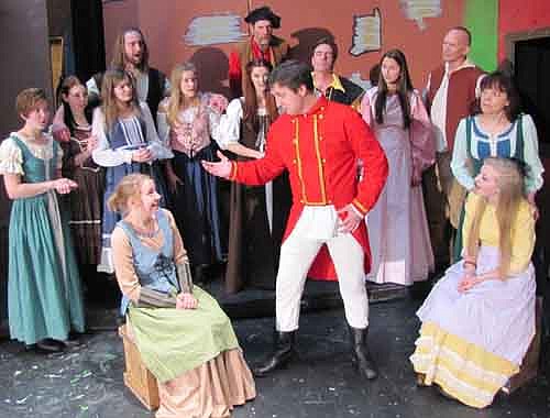 Captain Stickles (Rob Meyer), center, reveals a secret about Lorna to Betty (Becca Messick), seated left, and Eliza (Alexandra Kellner), seated right, during a dress rehearsal for Stewartville Community Theatre's upcoming presentation of Loving Lorna Doone. A cast of 31 actors and actresses will present the show at the Performing Arts Center this Friday, Feb. 28 and Saturday, March 1 at 7:30 p.m. both evenings, and this Sunday, March 2 at 2 p.m.