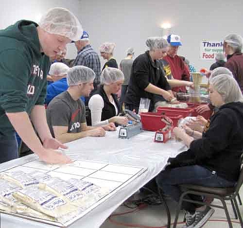 More than 250 volunteers helped with Stewartville's 11th annual Food for Kidz effort this past Saturday, April 5.