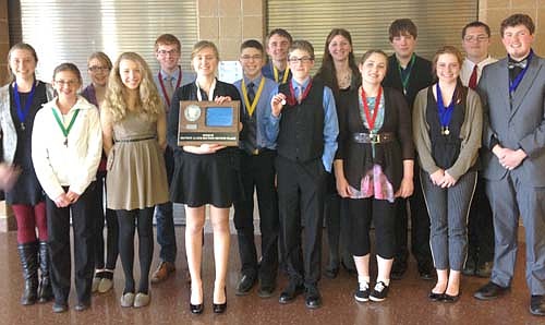 Thirteen members of the Stewartville High School Speech Team qualified for section competition at Byron, which was held this past Saturday, April 5. Team members include, front row, from left, Laura Pedelty, Hosanna Biffert, Gabrielle Steinhoff, Derrick Fritz, Nathan Onsgard, Diana Humble, Cassidy McCartan and Nathan Lange. In back, from left, Calli McCartan, Kyanne Hilger, Graham Mueller, Chase Quandt, Candi Quandt, Morgan Wildeman and George Skare. Stephanie Schmidt and Brandon Lange, two others who qualified for sections, are not pictured.