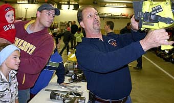 The Stewartville STAR's camera captured a number of highlights during 2007, including, Ike Duncan, assistant fire chief, displays a thermal imaging camera at the Stewartville Fire Department's annual open house. 