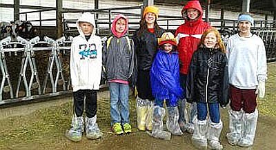 Members of High Forest Chippewa Champions 4-H Club toured Garlin Dairy near Eyota following their April 13 meeting. From left is Conner Lohmann, Dylan Lohnmann, Amelia Welter, Bailey Anderson,  Abby Wilson, Mesa Wibben, and JoJo Welter. The group learned about the dairy industry.  