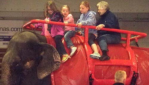 Ruth Pingree, 94, of Stewartville, is pictured with Karisa and Kayla Stevens (second and third from left) riding an elephant during the Rochester Jaycee's Circus on May 2. Ruth had made the comment that she has always wanted to ride an elephant. She got her wish. Seven residents of the Stewartville Care Center attended the circus.