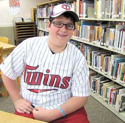 Aiden Higgins, a seventh grader at Stewartville Middle School, threw out the first pitch at Target Field on Sunday, May 18 after he hosted a dance at his Stewartville home to raise money for autism awareness.