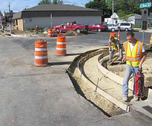 Workers continued to put in new ramps for the disabled at intersections along Main Street last week in conjunction with a major project to resurface Highway 63 from Stewartville to the Trunk Highway 16 intersection south of Racine. Bill Schimmel Jr., city administrator, said that the work is proceeding on schedule.