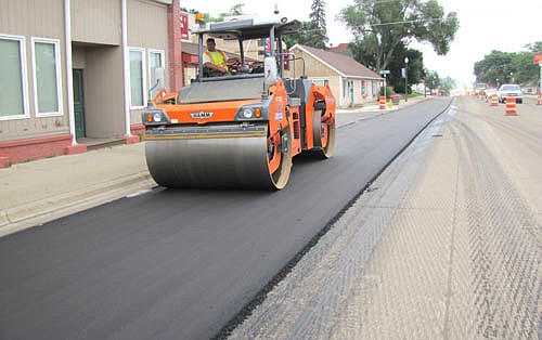 Traffic was backed up considerably along Main Street last week as workers resurfaced Highway 63 through Stewartville.