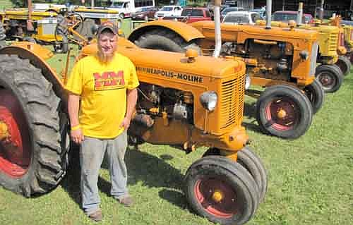 Andrew Kenning, 24, of Racine, brought 15 Minneapolis-Moline tractors to this year's Root River Antique Historical Power Association Antique Engine & Tractor Show south of Racine on July 18-20. Kenning showed the tractors in honor of Clarence Klenke, a Racine area farmer who died on June 21. Klenke, who hosted the Root River Show during the 1980s, owned most of the tractors Kenning brought to the show.  "It's in honor of him,"&#8200;Kenning said. "It's what he would have wanted."