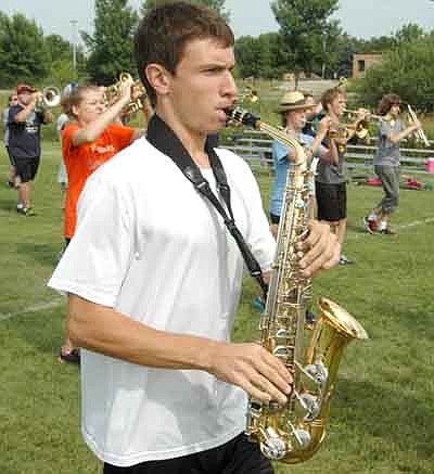 Jessica Honsey, director of the Stewartville High School Marching Band, instructed her students during last week's SHS Band Camp to help the musicians prepare for performances at the State Fair on Aug. 24, at Waseca on Sept. 20, at Luverne on Sept. 27 and at Algona, Iowa on Oct. 4. Here, Nathan Abbott plays the saxophone.