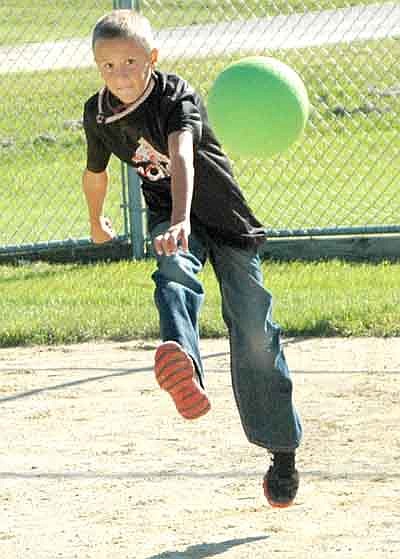 Children and adults alike had plenty of fun at the 91st annual High Forest Old Settlers Day on a sunny and beautiful Saturday afternoon, Sept. 13. Here, Isaac Larson, 10, of Stewartville, gives the ball a good boot in a kickball game that included dozens of kids.