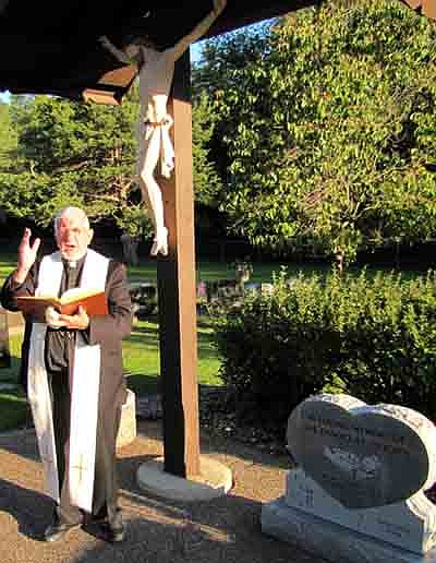 Fr. John Wilmot blessed the new monument to the innocent unborn at St. Bernard's Catholic Cemetery on Monday, Sept. 15.