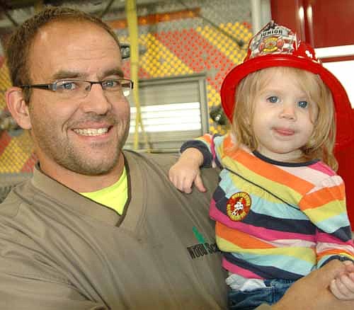 Ryan Davis of Stewartville and his daughter Emily, 1 1/2, very much enjoyed the event. Davis said that the open house is valuable because it teaches children how to prevent and respond to fire emergencies.