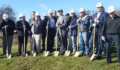 Halcon, city of Stewartville and area officials came together to break ground for the Stewartville company's new administrative and showcase building on a sunny and cool Tuesday morning, Nov. 4.