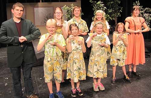 The Von Trapp family will sing for the Kaltzburg Festival in the upcoming Stewartville School District production of The Sound of Music. Actors and actresses include, front row, from left, Brandon Lange as Captain Von Trapp, Henry Gray as Kurt,  Amelia Mascotti as Brigitta, Ellie Young as Marta and Haylie Strum as Gretle. Back row, from left, are KyAnne Hilger as Liesl, Brenndan Walton as Friedrich, Gloria Nelson as Lousia and Calli McCartan as Maria. The show will be presented at the Performing Arts Center this Friday, Nov. 21 and Saturday, Nov. 22 at 7 p.m. both evenings, and on Sunday, Nov. 23 at 2 p.m.