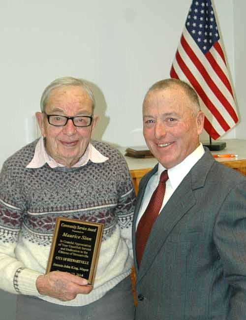 Maurice Sinn, left, accepted the Mayor's Award for Community Service from Mayor Jimmie-John King at the city of Stewartville's annual awards and recognition event last Wednesday evening, Dec. 10.