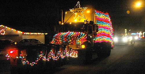 Sunshine Sanitation won the $100 first prize in the Winterfest float decoration contest with this truck blanketed by Christmas lights.