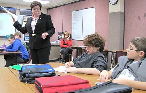 State Sen. Carlson Nelson speaks to a group of seventh graders in Jim Parry's REACH&#8200;for Success class at Stewartville Middle School on Monday afternoon, Dec. 15. Nelson told the students what it's like to be a senator and how the Senate works on passing a bill.