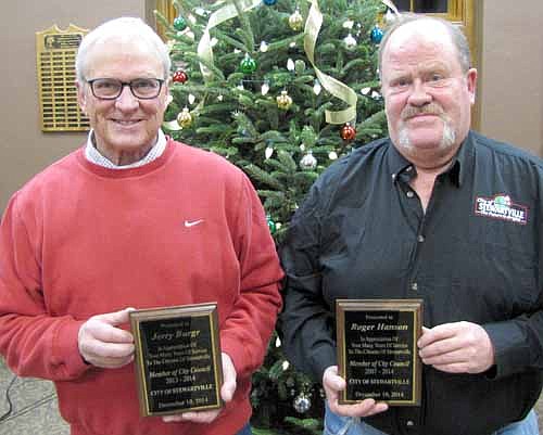 Jerry Burgr, left, and Roger Hanson received plaques thanking them for their service on the Stewartville City Council at the Council's last meeting of the year on Tuesday, Dec. 16.