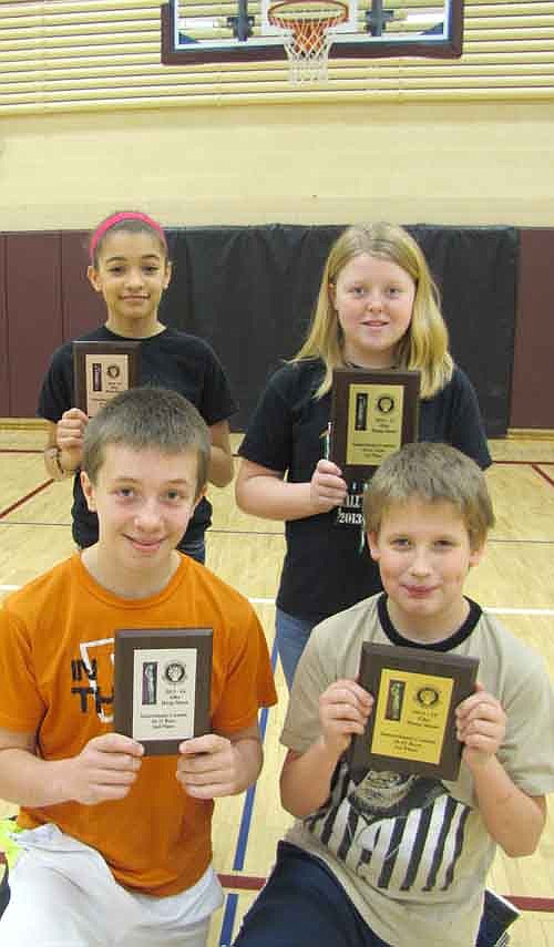 Winners of the Elks Hoop Shoot at Stewartville Middle School include, front row, from left, Josh Buri, second place, 10-11 boys; and Jules Smith, first place, 10-11 boys. Josh and Jules both made 13 of 25 free throws, with Jules winning first place in a tiebreaker. Back row, from left, Maia Peterson, second place, 10-11 girls; and Tessa Lanzel, first place, 10-11 girls. In all, 195 students between ages 10-13 took part in this year's free throw shooting contest during sixth- and seventh-grade P.E. classes.
