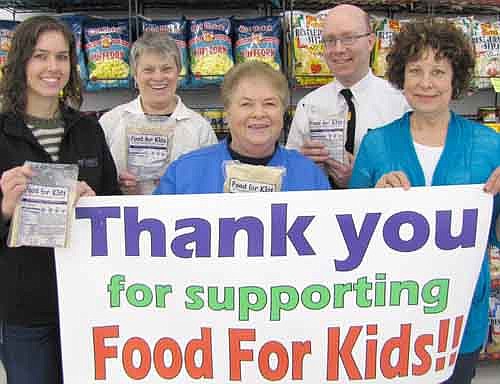 The Stewartville Kiwanis Club is sponsoring the 12th annual Food for Kidz food-packaging event for the poor to be held at the Stewartville Civic Center on Saturday, April 11 from 10 a.m. to 4 p.m. Some of the Kiwanis Club members helping with the event include, front row, from left, Laura Wiles, Iz Wilken and Carol Youdas. Back row, from left, Mary Brouillard of the Kiwanis Club and Robert Hruska, grocery manager of Fareway of Stewartville. Residents may donate to Food For Kidz at Fareway through February.