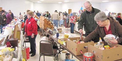 Hundreds of browsers and buyers attended the Stewartville Area Historical Society's 19th annual Cabin Fever Flea Market at the Stewartville Civic Center on Saturday, Feb. 21. Vicki Meredith, president of the Historical Society, says that proceeds from the event help the organization pay its bills and tend to its archival needs.