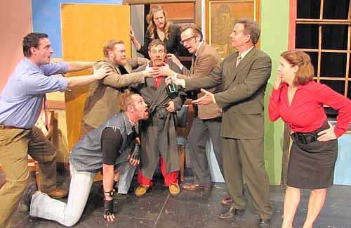 Everyone at the hospital has just figured out that Bill (Willie Dux), center, is the cause of all the problems they've been experiencing during a dress rehearsal for the upcoming Stewartville Community Theatre presentation of Ray Cooney's "It Runs in the Family," a high-speed British farce that will be presented at the Performing Arts Center this weekend. Show times are this Friday, March 6 and Saturday, March 7 at 7:30 p.m. both evenings and this Sunday,&#8200;March 8 at 2 p.m.  Aaron Rocklyn, director, says that the cast has rehearsed for six weeks. "We leave the real world behind us, and we're having fun," he said.