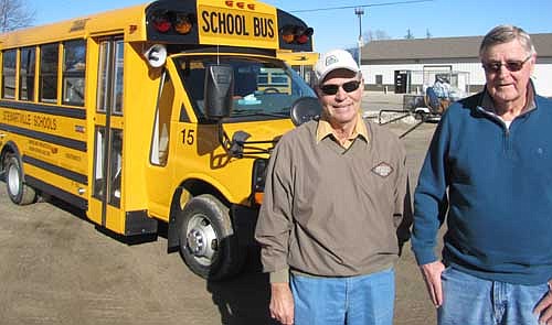 Del Johnson, left, and Dick Johnson, two long-time drivers for Grisim School Bus, Inc., are stepping down from their driving duties. Del drove for 22 years, Dick for 15. Both enjoyed their relationships with the students who rode on their buses. "I think we both got along really well with the kids on our routes," Dick said. "That's what makes it enjoyable."